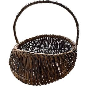 Vintage Buttock Basket with Handle – Beautiful, dark woven design, collectible.
